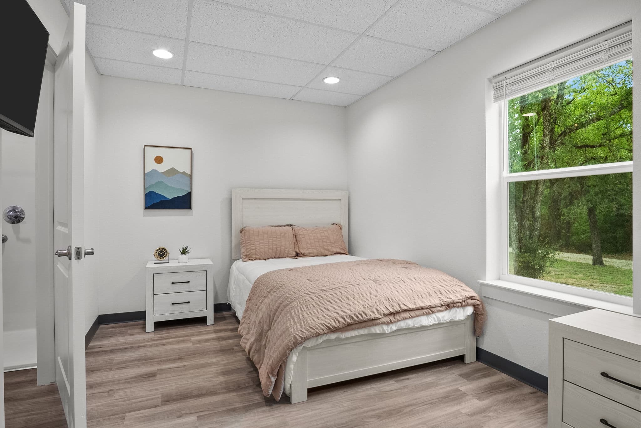 Private bedroom with a window over the grounds