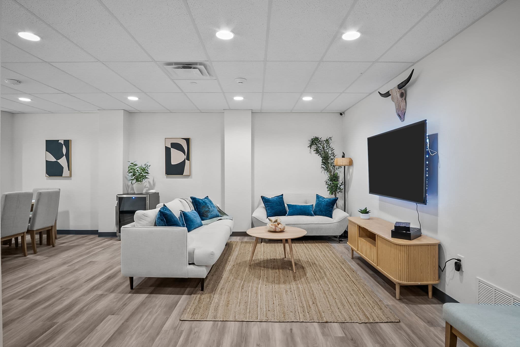 Lounge seating area with a wall-mounted television